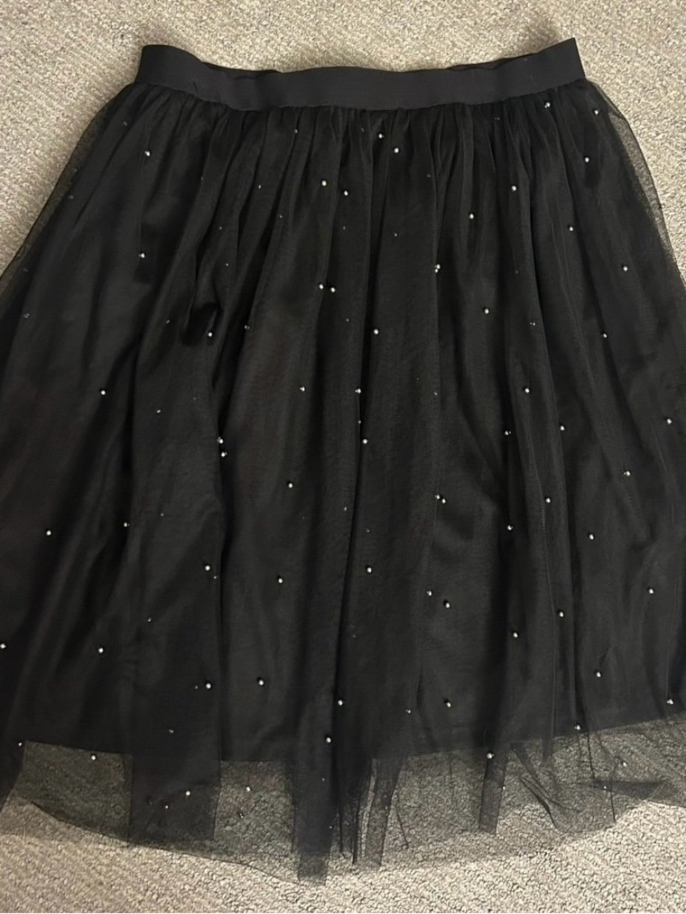Black faux pearl lined stretchy skirt